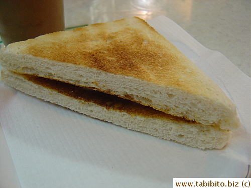 His thick toast sandwich